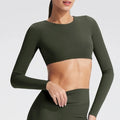 Women's long-sleeved yoga top with built-in breast pads, breathable and comfortable, suitable for gym workouts and fitness.